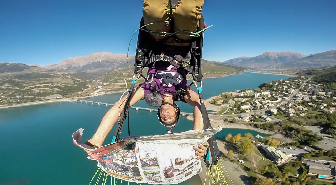 Glide Paragliding Ragolski Francois read news paper head down savine le lac